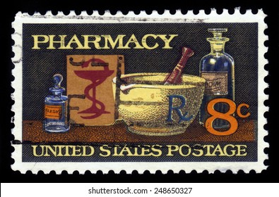 UNITED STATES OF AMERICA - 1972: A stamp printed in the United States of America shows image of typical items in a pharmacy, mortar and pestle, bowl of Hygeia, 19th century medicine, series, 1972