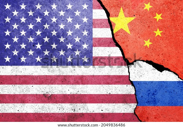 United States of America, China and Russia flags\
painted on the concrete\
wall