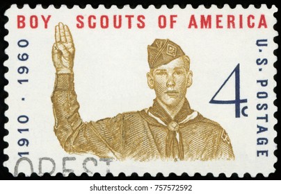 UNITED STATES OF AMERICA - CIRCA 1960: A Stamp Printed In USA Shows Boy Scout Giving Scout Sign, With Inscription 