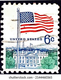 United States Of America, Circa 1968: Postage Stamp Showing Flag And White House.