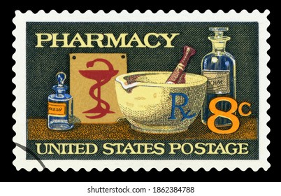 UNITED STATES OF AMERICA - CIRCA 1972: A stamp printed in America shows image of typical items in a pharmacy, mortar and pestle, bowl of Hygeia, circa 1972.	