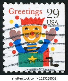 UNITED STATES OF AMERICA - CIRCA 1993: stamp printed in USA (US) shows smiling jack in the box; scott 2791 29c; greetings; Christmas; circa 1993