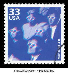 UNITED STATES OF AMERICA, CIRCA 1999: a postage stamp printed in USA showing an image of people watching a 3D movie, circa 1999.