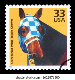 UNITED STATES OF AMERICA - CIRCA 1999: A Postage Stamp Printed In USA Showing An Image Of Secretariat The First Racehorse To Win The US Triple Crown, Circa 1999.