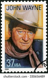 UNITED STATES OF AMERICA - CIRCA 2004: A stamp printed in USA shows Marion Mitchell Morrison John Wayne (1907-1979), series Legends of Hollywood, circa 2004