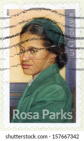 UNITED STATES OF AMERICA - CIRCA 2013: forever post stamp printed in USA shows Rosa Parks (1913-2005), African American civil rights activist, black green, circa 2013