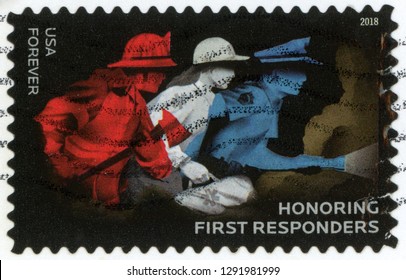 UNITED STATES OF AMERICA - CIRCA 2018: Forever Post Stamp Printed In US (USA) Shows Firefighter With Axe, EMS Worker With Emergency Bag, Police Officer With Flashlight; Honoring First Responders; Scot