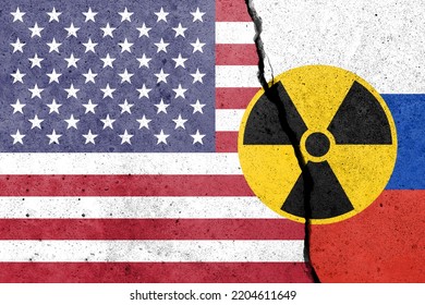 United States Of America And Russia Flags Painted On A Concrete Wall With Nuclear Weapon Sign