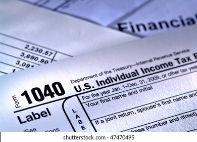 United States American IRS Internal Revenue Service income tax filing form 1040 for revenue reporting preparation with financial papers