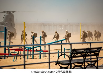 United States American Soldiers Marching On The Beach Into A Helicopter In Brooklyn, New York. USA May 21, 2009.