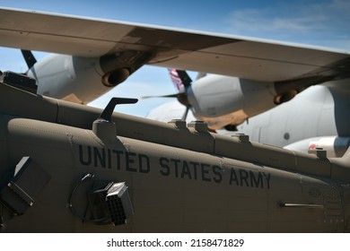 United States Army Logo Written Of A Military Helicopter Part Of The US Air Force. Military And Army Industry.