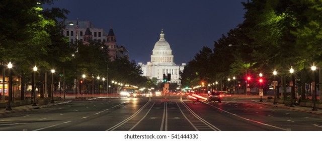 The United States Capitol Building And Constitution Avenue In Washington DC At Night