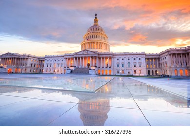 The United States Capitol Building With The Dome Lit Up At Night USA. 