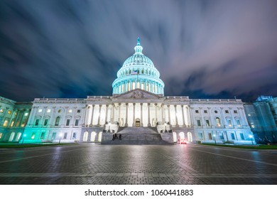 The United States Capitol building at night.