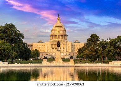 The United States Capitol building and Capitol Reflecting Pool at sunset  in Washington DC, USA