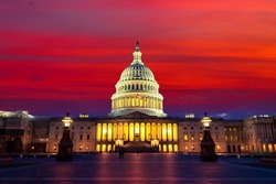 The United States Capitol Building At Sunset At Night In Washington DC, USA