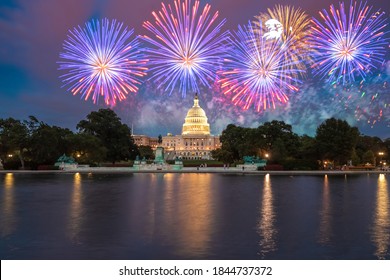 The United States Capitol Building In Washington DC At Night With Fireworks