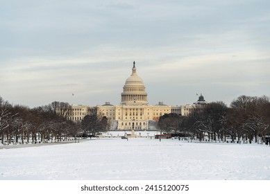 United States Capitol Building in Washington, D.C., during winter. Snow. Winter. Government. United States Senate and United States House of Representatives.     - Powered by Shutterstock