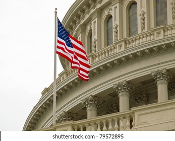 United States Capitol Building In Washington DC With American Flag