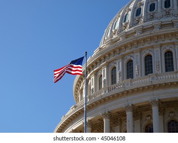 The United States Capitol Dome And Flag In Washington DC.