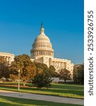 United States Capitol under a blue sky at sunset. Washington D.C., USA