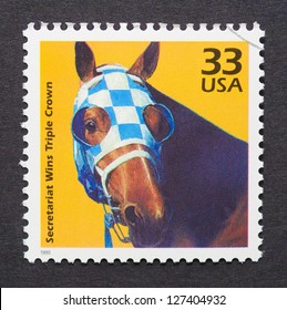 UNITED STATES - CIRCA 1999: A Postage Stamp Printed In USA Showing An Image Of Secretariat The First Racehorse To Win The US Triple Crown, Circa 1999.