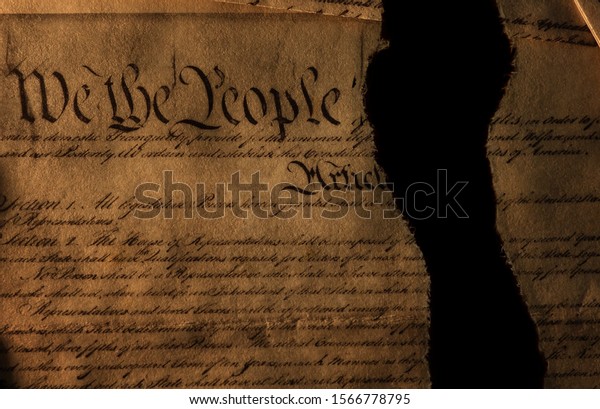 The United States Constitution\
showing We The People torn in half                              \
