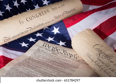 United States Declaration Of Independence, Constitution And Bill Of Rights On An American Flag