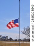 The United States flag flying at half mask outside the town hall in Lakeland GA, In Honor of the late President Jimmy Carter!(1924-2024, 100yrs)