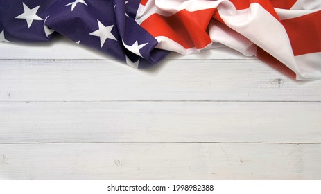 United States Flag On White, Weathered Wooden Clapboard Background 