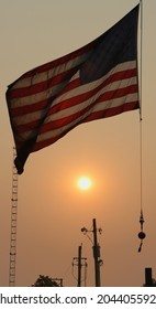 United States Flag Previously Flow Over Ground Zero After 911 Terrorist Attacks - Flag Photographed At Sunrise