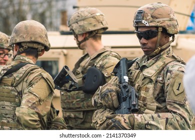 United States - March 29 2022: United States Marine Corps Soldiers With Shotgun Or Rifle, Helmets And Armored Vehicle Humvee, USA Or US Army Troops Ready For Battle, Drills Or War In The City