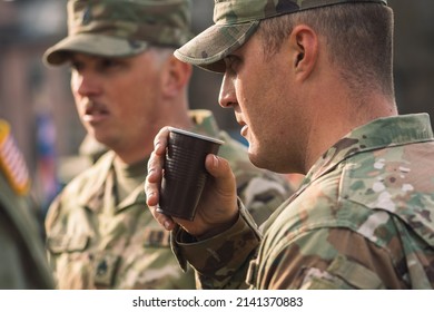 United States - March 29 2022: United States Marine Corps Soldiers Drinking Coffee And Making Plans During A Break, USA Or US Army Troops Ready For Drills, Battle Or War 