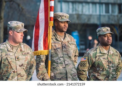 United States - March 29 2022: United States Marine Corps Soldiers With American Flag During A Ceremony, USA Or US Army Troops Ready For Drills Or War