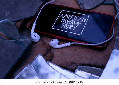 United States New York. Tuesday, October 1, 2019, Headphones And Iphone 11 Pro With The American Horror Story Logo. American Horror Story Is A Drama And Horror Television Series.