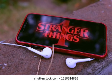 United States New York. Tuesday, October 1, 2019, Headphones And Iphone 11 Pro With The American Horror Story Logo. American Horror Story Is A Drama And Horror Television Series.