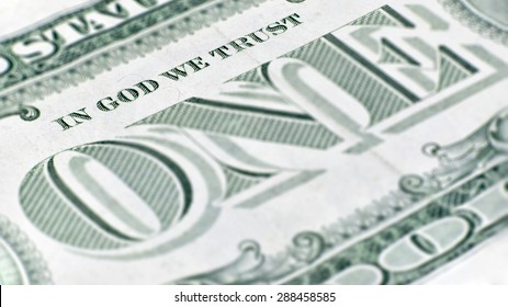 The United States One Dollar Bill, A Macro Closeup Emphasizing The Inscription 