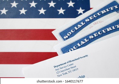 United States Social Security Number Cards Lies With USCIS Envelope On US Flag