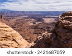 United States. Utah. Canyonlands National Park. From Mesa Arch, canyons with La Sal Mountains in the background. 