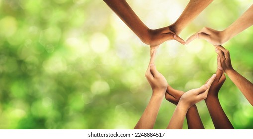 Unity and diversity are at the heart of a diverse group of people connected together as a supportive symbol that represents a sense of and togetherness. Symbol and shape created from hands. - Powered by Shutterstock