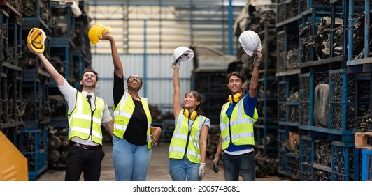 Unity and teamwork concept. team standing hands together. Professional Mechanical Engineer team Working at Second-hand spare parts of old car parts warehouse store. High five. - Powered by Shutterstock