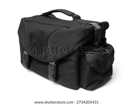 A universal black camera bag with padding and multiple pockets. Perfect for product advertising, lifestyle photography, and camera equipment storage concepts.