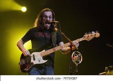 UNIVERSAL CITY, CA - JUNE 22: Geddy Lee of the rock band Rush hits the stage for part of their Time Machine Tour at the Gibson Amphitheater in Universal City, CA on June 22, 2011.