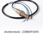 Universal Oxygen sensor for gasoline and diesel engines on white background. lambda probe universal sensor for various car models.