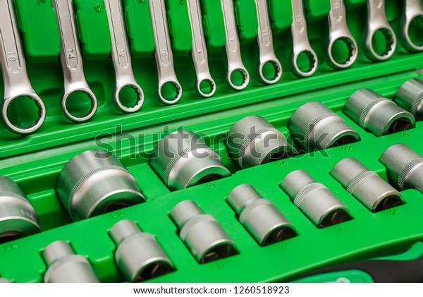 Universal tool set for car repair.\
Background. Set of tools for car repair in box,\
closeup