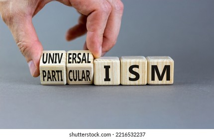 Universalism or particularism symbol. Concept words Universalism or Particularism on cubes. Businessman hand. Beautiful grey background. Business universalism or particularism concept. Copy space. - Shutterstock ID 2216532237