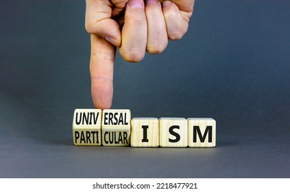 Universalism or particularism symbol. Concept words Universalism or Particularism on cubes. Businessman hand. Beautiful grey background. Business universalism or particularism concept. Copy space. - Shutterstock ID 2218477921