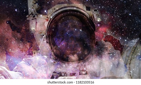 Universe filled with stars, nebula and galaxy. Elements of this image furnished by NASA - Shutterstock ID 1182103516