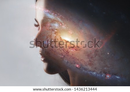 The universe inside us, the profile of a young woman and space, the effect of double exposure. scientific concept. The brain and creativity. Elements of this image furnished by NASA.