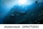 The universe of scuba divers. Underwater photo of the USS Liberty Shipwreck from World War Two, WWII. From a scuba dive in Bali, Indonesia, Asia.